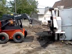 skid steer through creek bottom|skid steer flipping over.